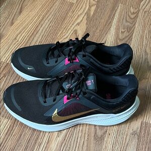 Nike Women's Black and Gold Athletic Shoes very good condition